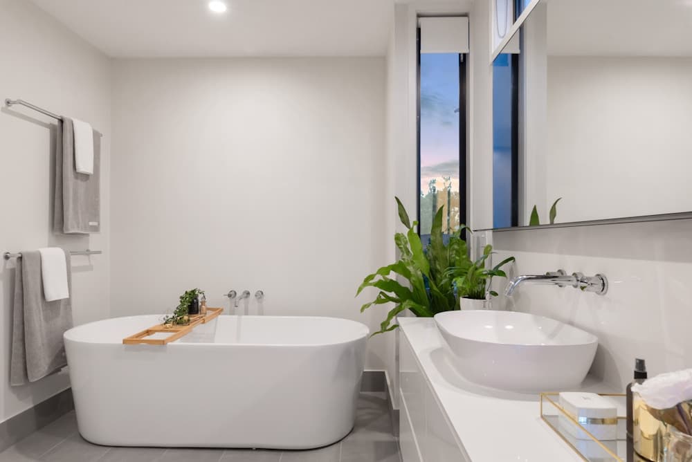 Bathroom with contemporary fittings and warm natural finishes